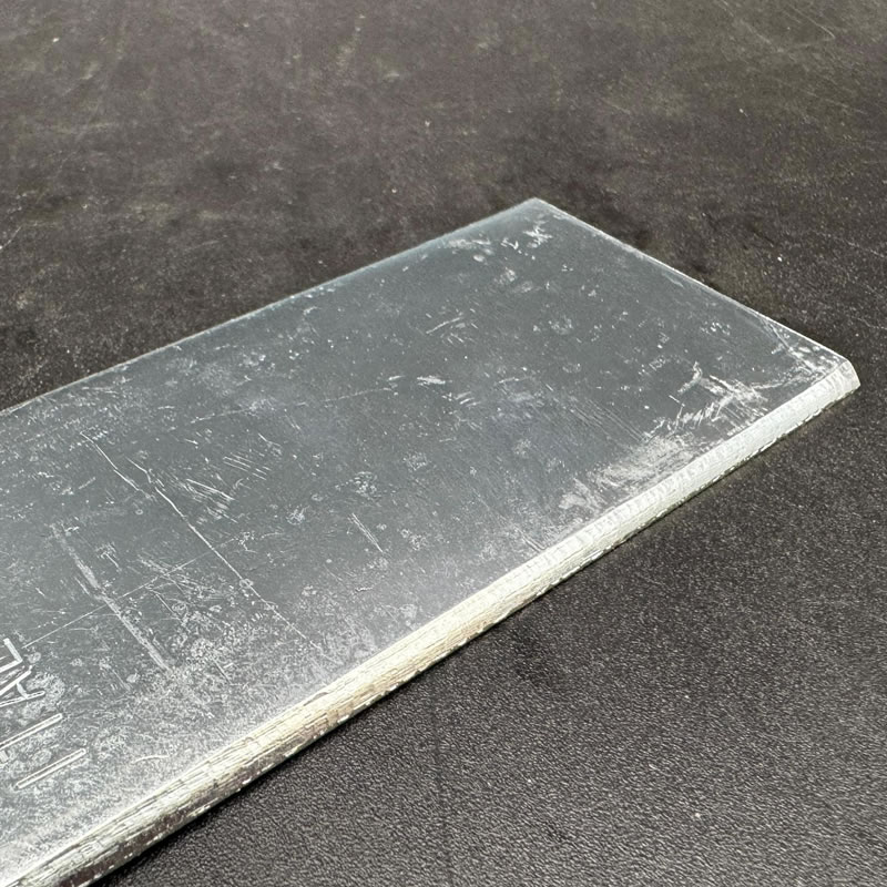 Close-up of Cugina, a universal two-tooth flat blade for brushcutters.